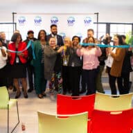 Bronx Borough President Vanessa L. Gibson, VIP Community Services executives and new Ruiz Butter House residents celebrate the ribbon-cutting.