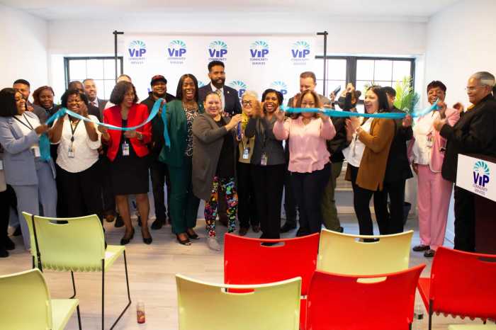 Bronx Borough President Vanessa L. Gibson, VIP Community Services executives and new Ruiz Butter House residents celebrate the ribbon-cutting.