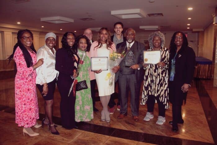 Debra Tirado was honored at the awards breakfast ceremony entitled “Standing on Their Shoulders Honoring Phenomenal Women”. She poses with her family and friends, Gloria Bent , Cheryl Johnson, Anaheim Johnson,Olivia Webber, Debra G. Tirado, Kevin Lincoln, Connie Greene, Patricia Lincoln, Serafin Tirado and Maddison Tirado.