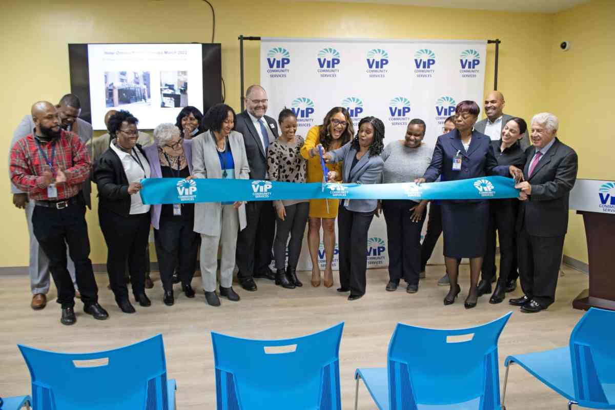 A group photo cutting the ribbon with Carmen Rivera, chief Vocational and Community Affairs officer at VIP; Opal Dunstan, executive vice president and chief operations officer; Debbian Fletcher-Blake, VIP Community Services president and chief executive officer and many others.
