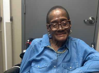 Bronx resident and Williamsbridge Center patient Karen Reid smiles for a photo. Reid was declared cancer-free on April 2.
