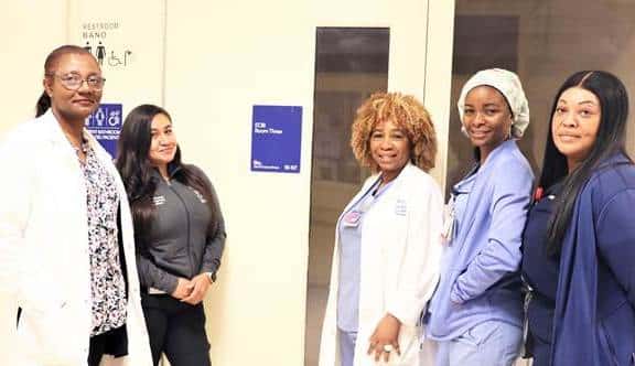 Staff at NYC Health + Hospitals/Jacobi | North Central Bronx (NCB) smile for a photo.