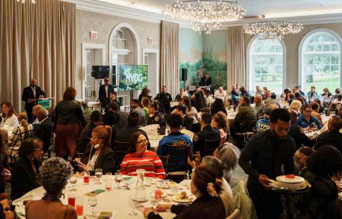 Community members gather for the Heroes Recognition Breakfast at the New York Botanical Garden. This event was open to the public.