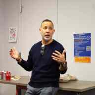 Ignacio Jaureguilorda, project director at the Center for Justice Innovation, speaks to attendees at the new Bronx Legal Hand location.