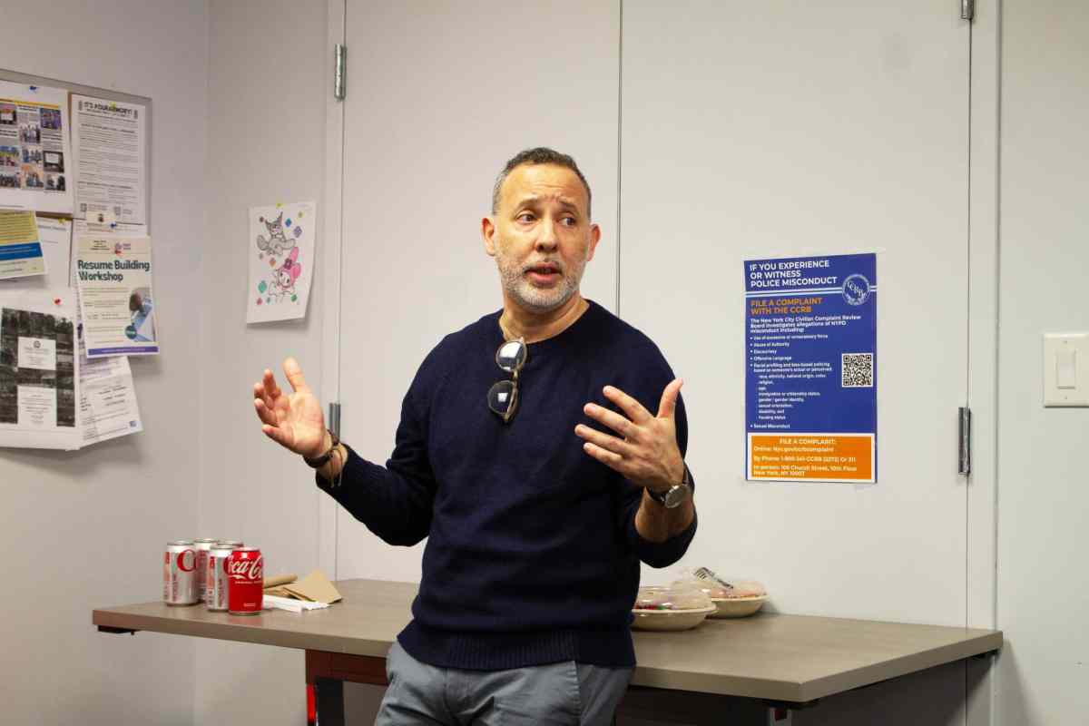 Ignacio Jaureguilorda, project director at the Center for Justice Innovation, speaks to attendees at the new Bronx Legal Hand location.
