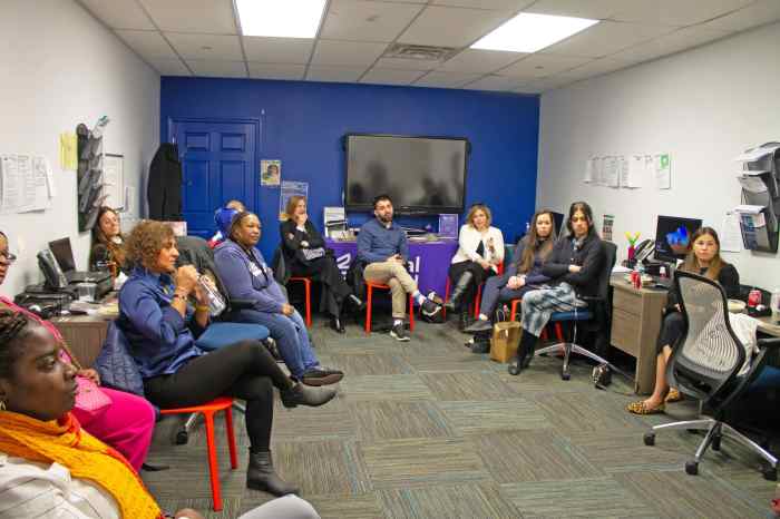 Attendees, including Legal Hand volunteers and Learning Exchange project for the Justice First Fellowship members, listen to Jaureguilorda.