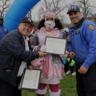 Crusaders for Children's Rights received certificate of appreciation from Never End Love & The 52nd Precinct Community Affairs and PO Echevarria at the Easter Egg Hunt.