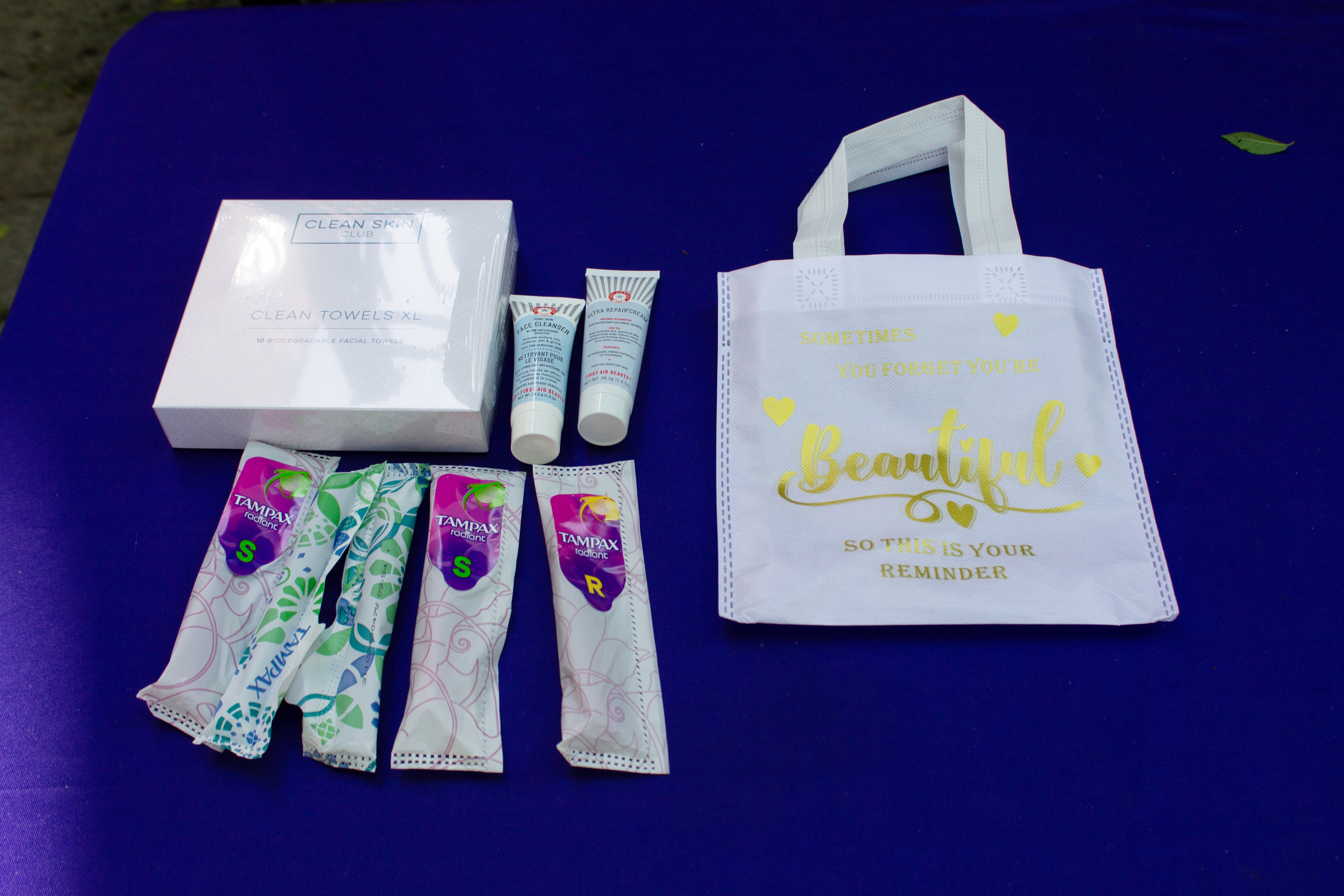 Distributed bags were filled with menstrual hygiene products, a box of biodegradable facial towels from the Clean Skin Club, and First Aid Beauty skin cleansing products. Photo Jewel Webber