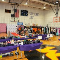 Students left the annual prom giveaway in style after selecting their dress or tuxedo of choice.
