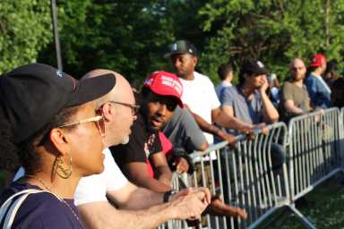 People listen outside former President Donald Trump's campaign rally in the Bronx's Crotona Park on Thursday, May 23, 2024.