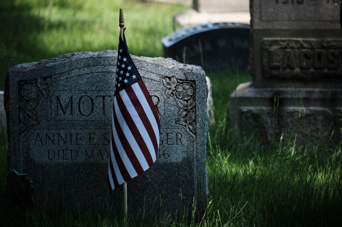 A mother and veteran is honored with a flag on May 20, 2024.