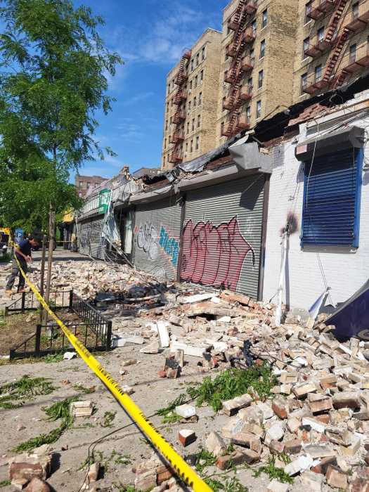 A parapet wall collapses in the Bronx on Thursday, June 20, 2024.