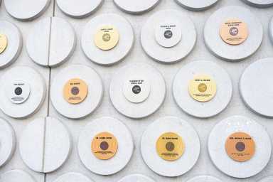 Plaques acknowledging individuals and organizations who have played meaningful roles in the development of the Bronx Music Heritage Center and the Bronx Music Hall.