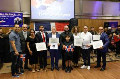 Honorees pose with local elected officials at the third annual Noche Quisqueyana at The Bronx Zoo on Friday, July 26, 2024.
