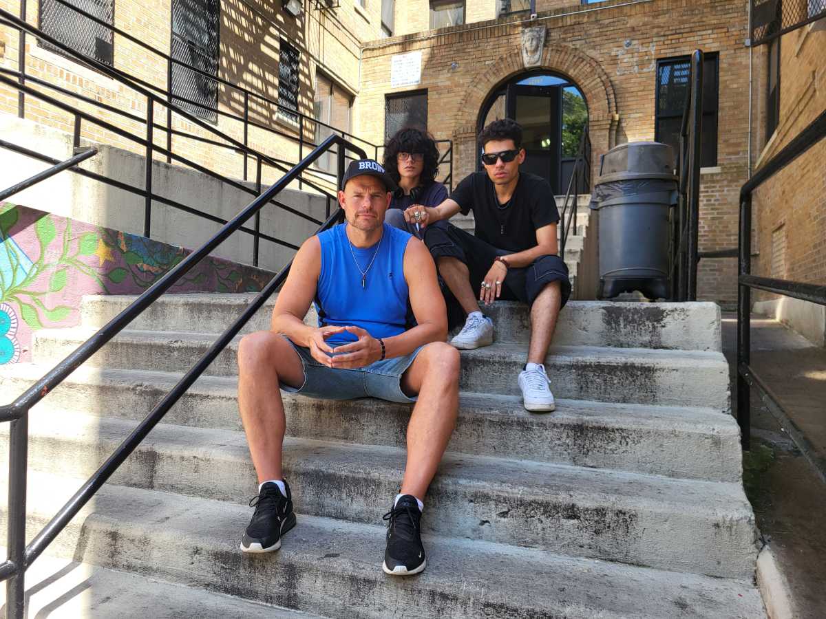 Ex-CUNY professor Danny Shaw (front), a longtime South Bronx resident, with his two sons, ages 17 and 22.