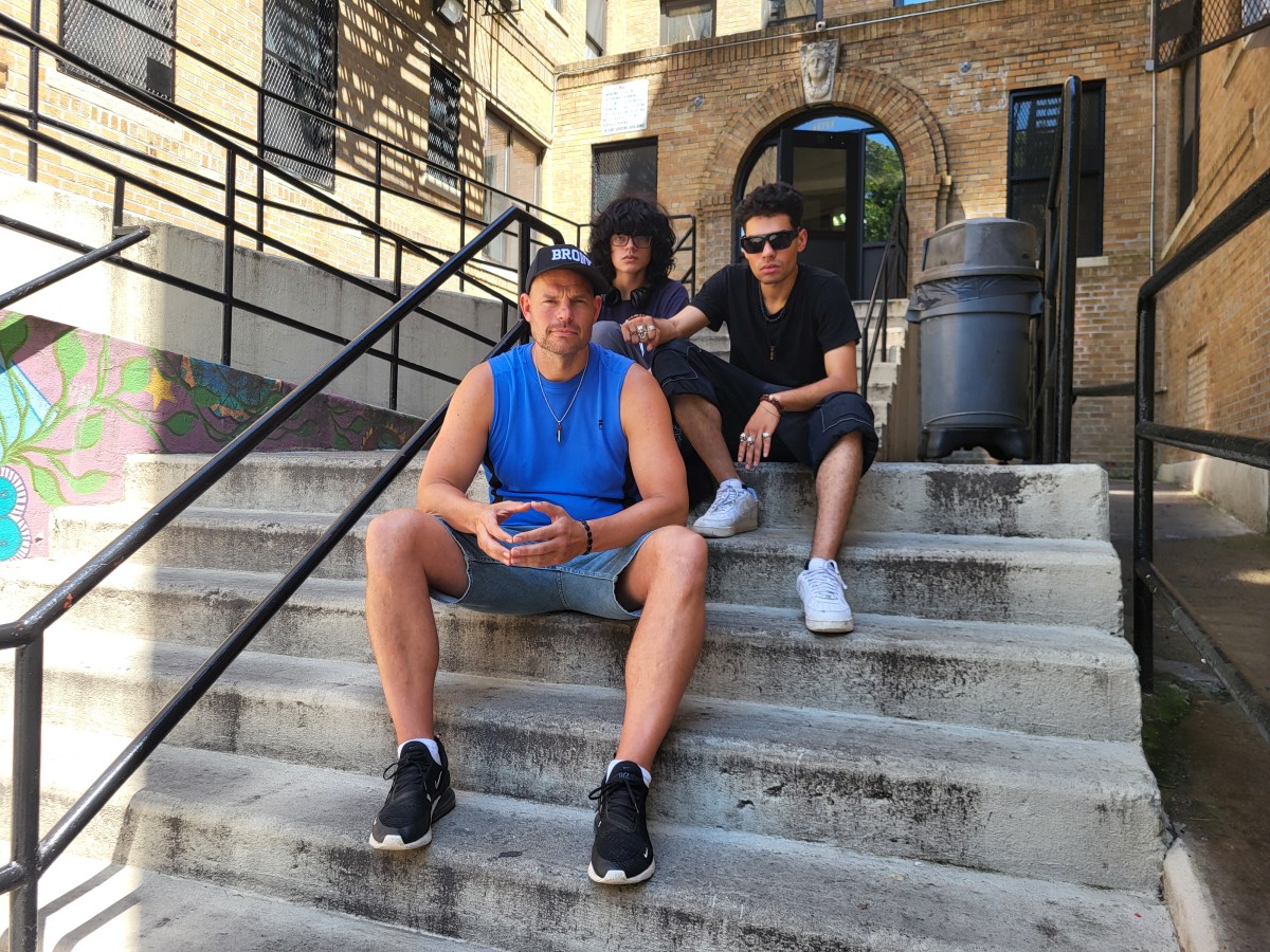Ex-CUNY professor Danny Shaw (front), a longtime South Bronx resident, with his two sons, ages 17 and 22.