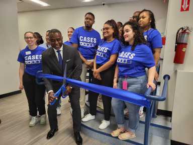 onathan McLean, CEO of the CASES Center serving court-involved New Yorkers, cut the ribbon for the new South Bronx office on July 18, 2024.