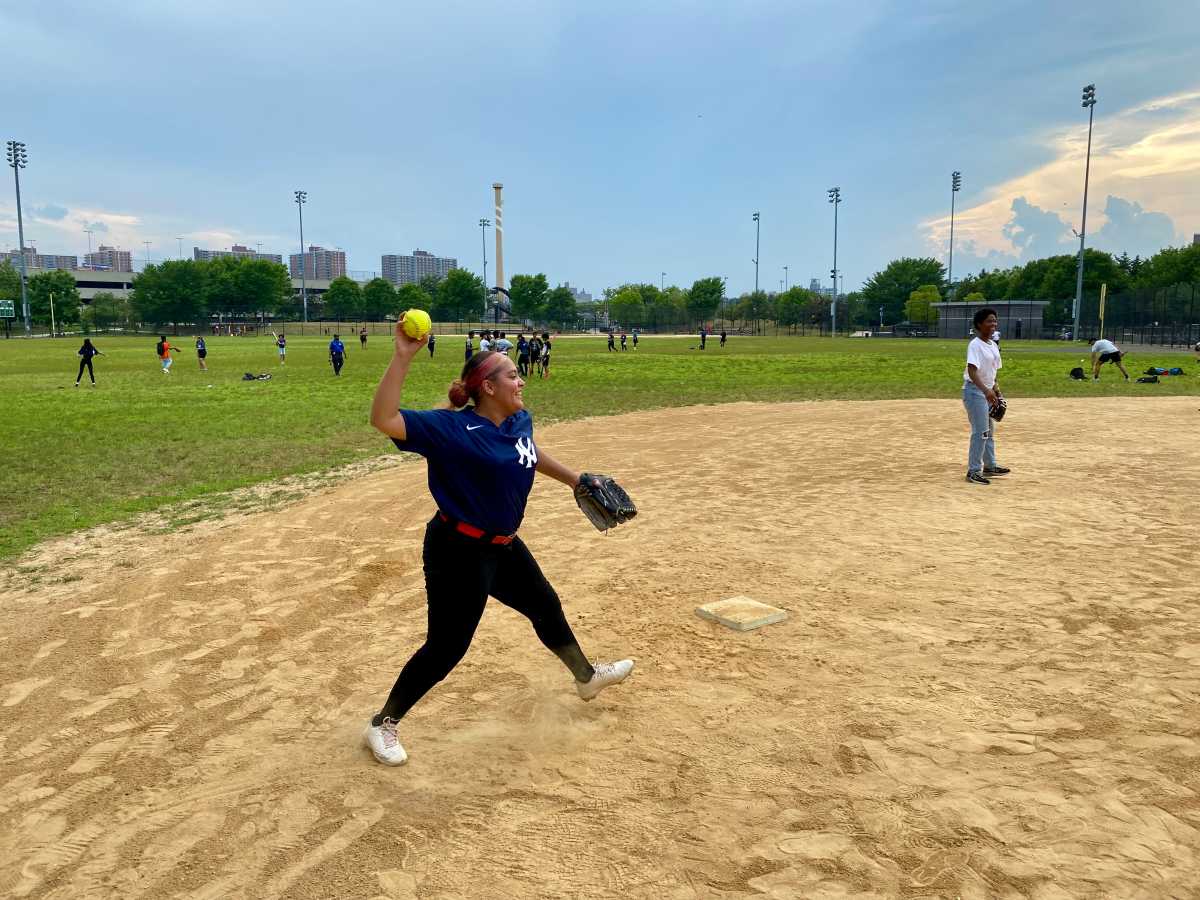 One player throws a ball from third base on opening day on July, 9 at Elston Gene Howard Field.