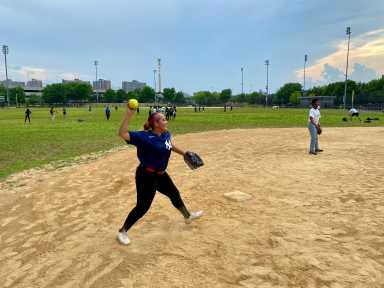 One player throws a ball from third base on opening day on July, 9 at Elston Gene Howard Field.