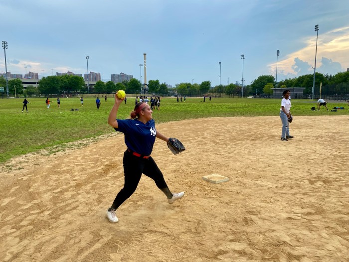 One player throws a ball from third base on opening day on July, 9 at Elston Gene Howard Field.