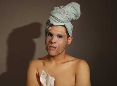 Adrian Costa prepares for the shower in "Bathroom Play."