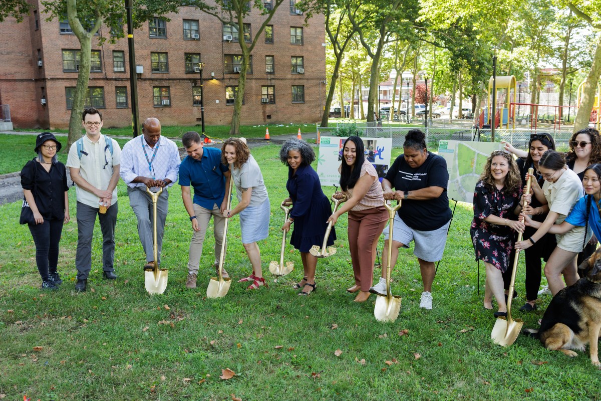 Community members, NYCHA representatives and elected officials break ground on an improved green space project, including a dog park, at the Castle Hill Houses in Castle Hill on Monday, Aug. 5, 2024.