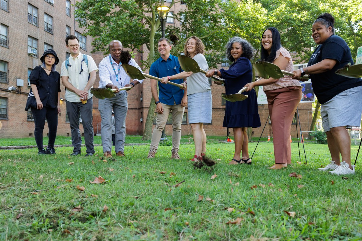 Community members, NYCHA representatives and elected officials break ground on an improved green space project, including a dog park, at the Castle Hill Houses in Castle Hill on Monday, Aug. 5, 2024