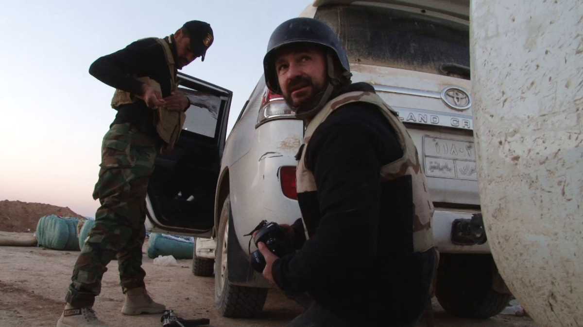 Andre Liohn (left) squats camera-ready mid-battle scene. Photo courtesy IMDb