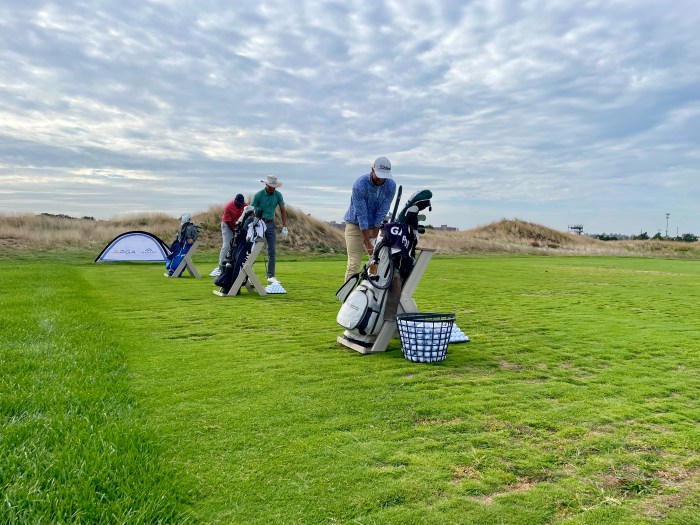 APGA Tour players Joey Stills, Andrew Walker, and Michael Bradham facilitate a junior golf clinic Wednesday at Bally's Golf Links at Ferry Point.