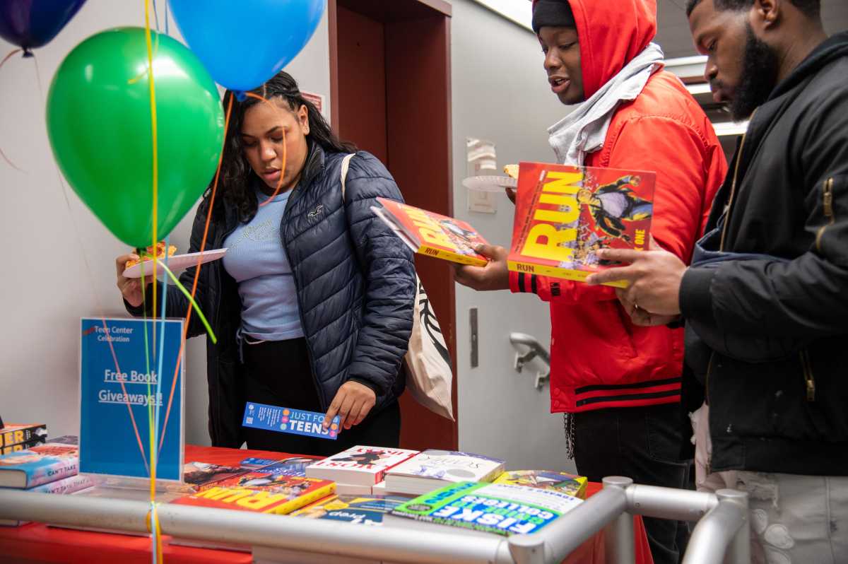 The Allerton Library celebrated the expansion of its Teen Center Wednesday with a pizza and craft party. Students took home free books, shirts and other party favors at the event.