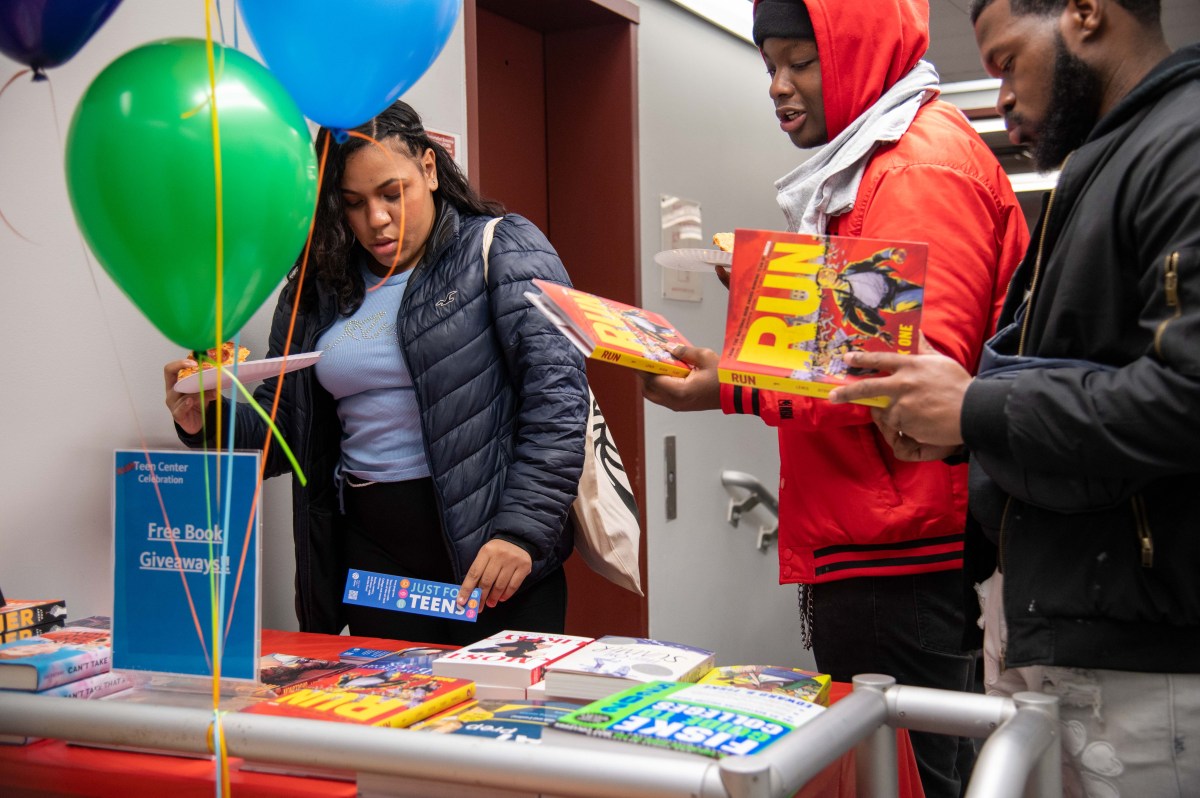 The Allerton Library celebrated the expansion of its Teen Center Wednesday with a pizza and craft party. Students took home free books, shirts and other party favors at the event.