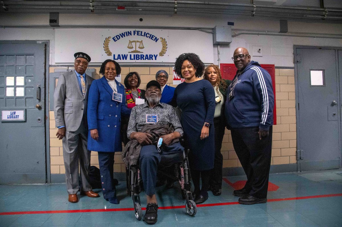 NYC Department of Corrections Commissioner and the family of longtime DOC employee, Edwin Felicien, unveiled the law library at Rikers Island, newly named in his honor.