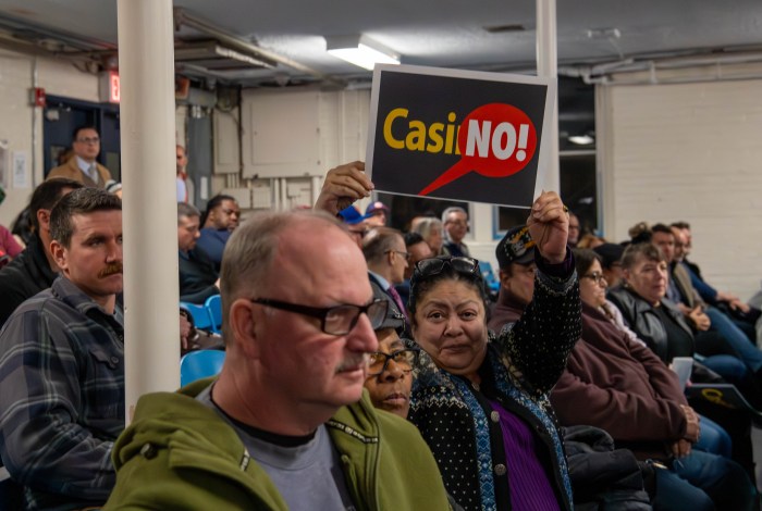 Throggs Neck residents waved signs reading "CasiNO!" to express their outrage at the proposed casino that Bally's Corporation wants to build in the Bronx.