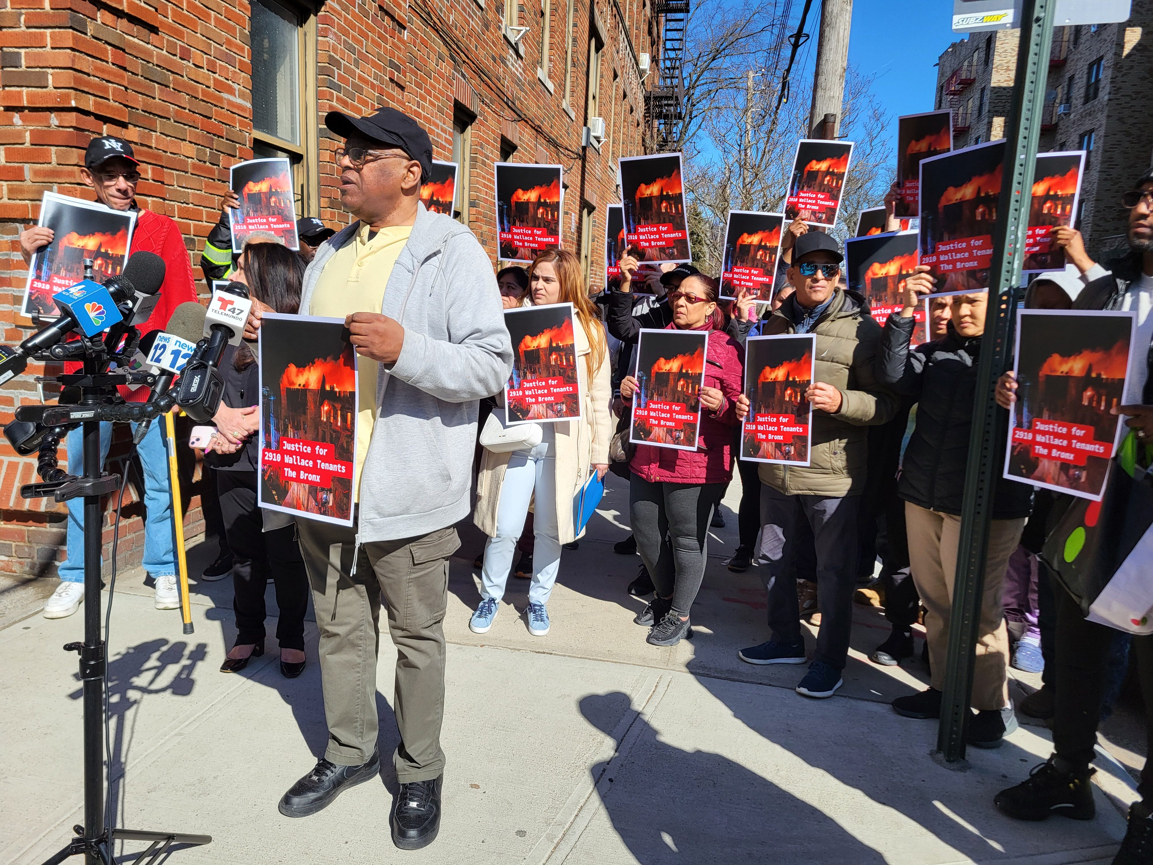 Fire-displaced residents of 2910 Wallace Ave. rally for ongoing