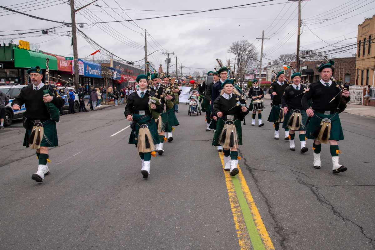 Bag pipers and drummers marched down East Tremont Avenue in festive garb Sunday for the 27th annual Throggs Neck St. Patrick's Day Parade.