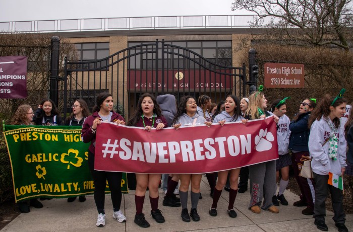 Students ended the St. Patrick's Day parade by continuing their march through Throggs Neck and coming together outside the gates of Preston High School, singing and chanting protests.