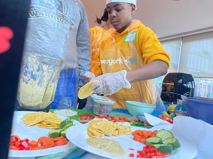 A team of young chefs from the Bronx plated their first round of dishes Thursday at a cooking competition at the waterfront apartment building Level BK in Williamsburg.