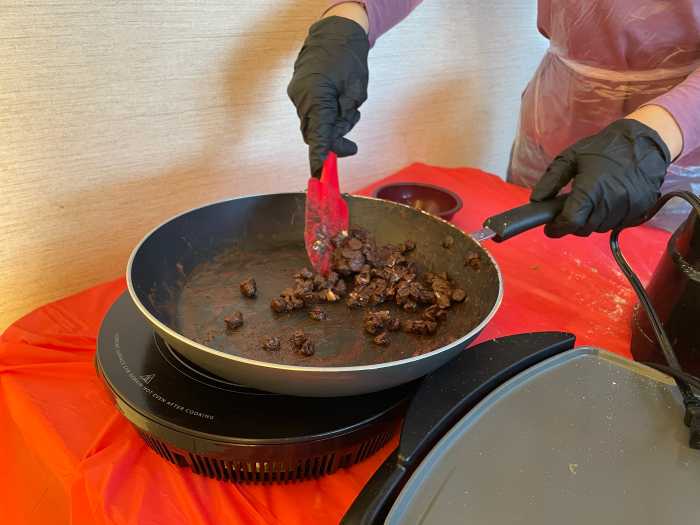 A group of students from Luisa Dessus Cruz middle school in the South Bronx melted chocolate to top a mint and chocolate cookie that they baked in an air fryer.