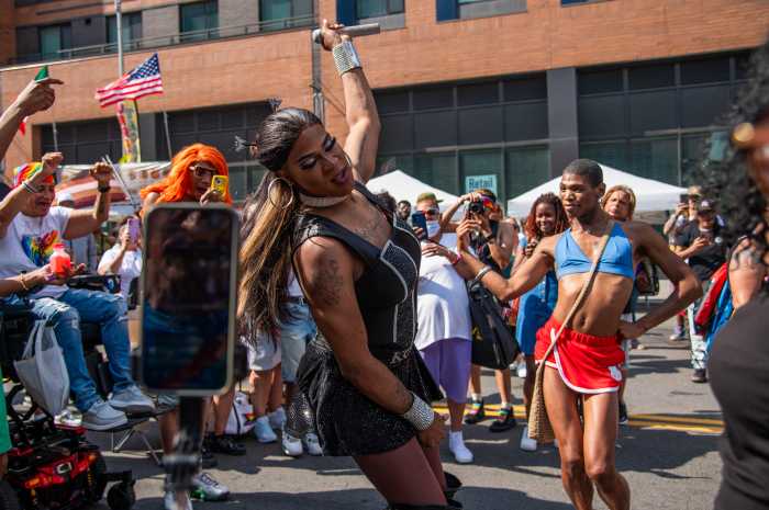 A crowd surrounded "The Princess of the Bronx" Kelly Kaboom, cheering and dancing as she gave a drag performance at the Bronx Pride Festival of Saturday.
