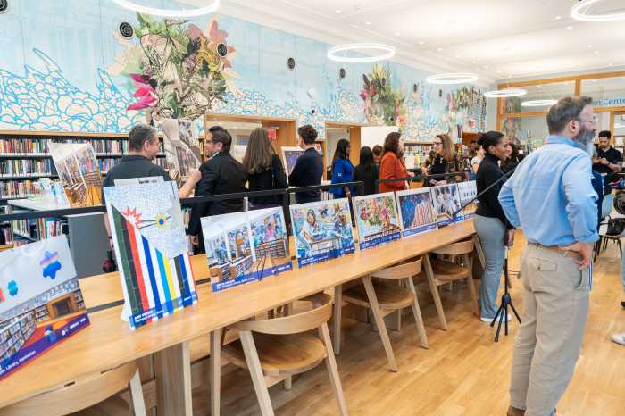 Images of public artwork at five libraries across three boroughs were displayed at Hunts Point Library Wednesday when the city announced their completion.