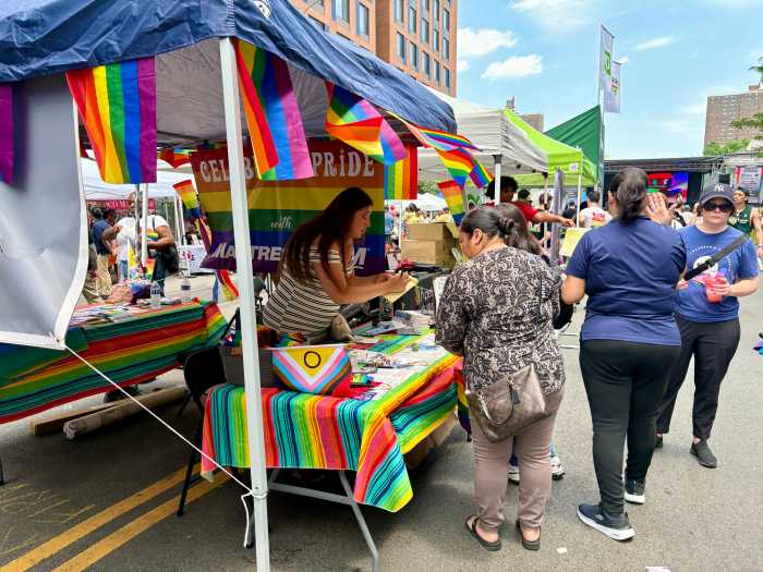 Organizations, food trucks and local vendors set up tents at the Bronx Pride Festival on Saturday with rainbow themed Pride swag, resource pamphlets and games with prizes.