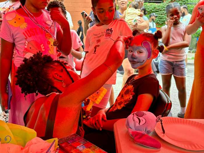 Children got their faces painted, played games and ate cotton candy or frozen treats. 
