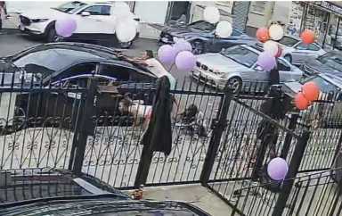 Surveillance footage showed 27-year-old Austin Morrishow firing a gun from behind a parked car. Authorities said one of Morrishow's bullets, which he possessed illegally seriously injured a 5-year-old girl who was sitting in the back of her father's car.