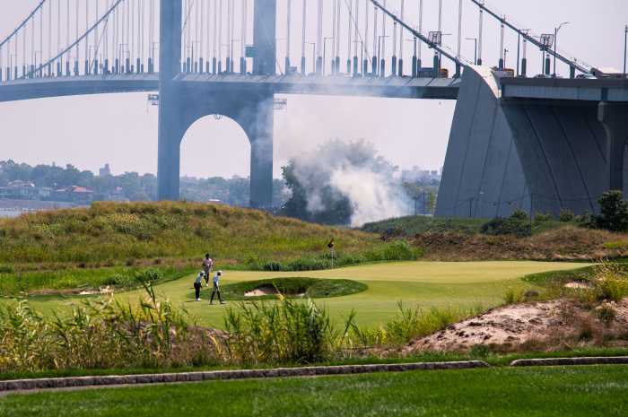 Shortly after the junior golf clinic at Bally's Ferry Point began on Monday, plumes of smoke began to fill the air nearby in Ferry Point Park underneath Throgs Neck Bridge.