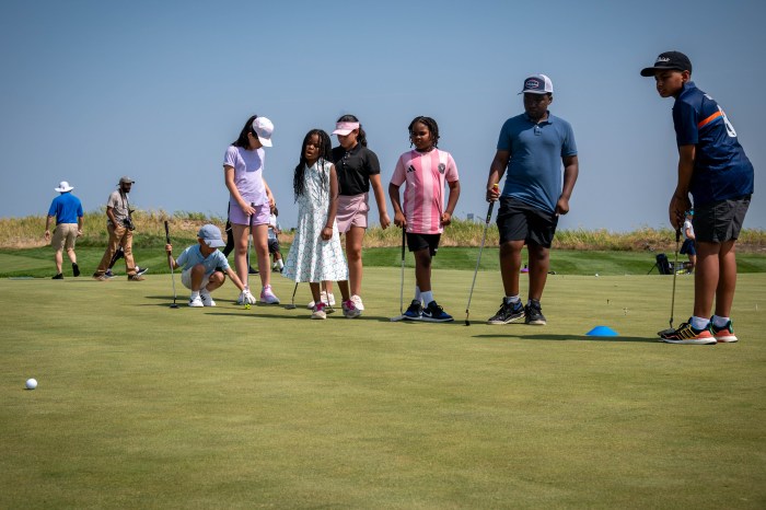 Dylan Garcia, 12, was the only junior golfer in his group to sink a putt in one shot during the competition. He told the Bronx Times that he made sure to pay attention to the slope of the course to anticipate where the shot would send his golf ball.