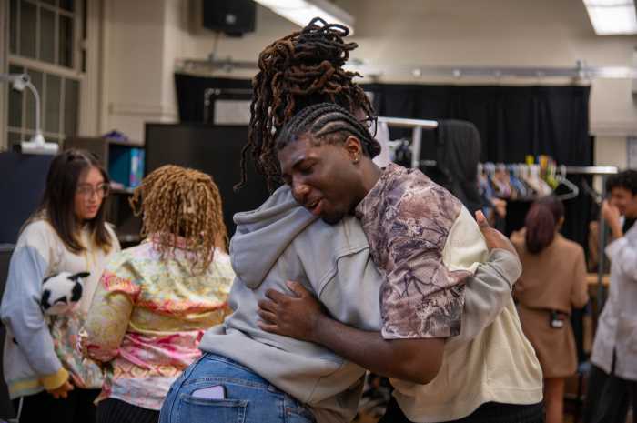 Students encouraged each other backstage in the dressing room ahead of the premiere of the original courtroom drama, "Reasonable Doubt."