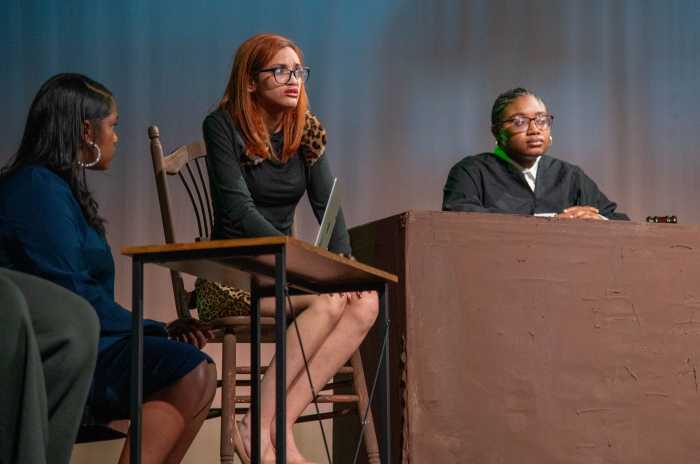Aylee Diaz (center) played the lead, Elena Price, who had many uncomfortable and emotional moments on the witness stand while one trial for the murder of her husband.