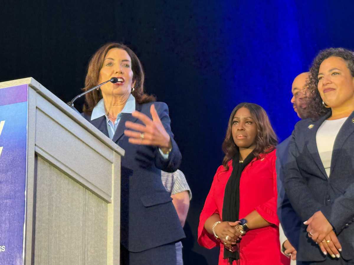 Gov. Kathy Hochul speaking at Bronx Day in Albany, alongside Bronx Borough President Vanessa Gibson and State Sen. Nathalia Fernandez.