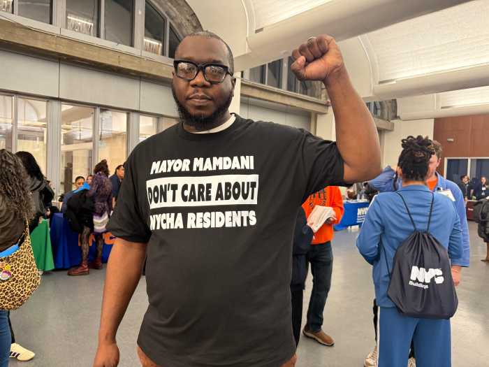Rev. Kevin McCall, who organized a counter rally outside the hearing for NYCHA residents.
