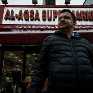 A man shopping at Al-Aqsa Supermarket in Bangla Bazaar.